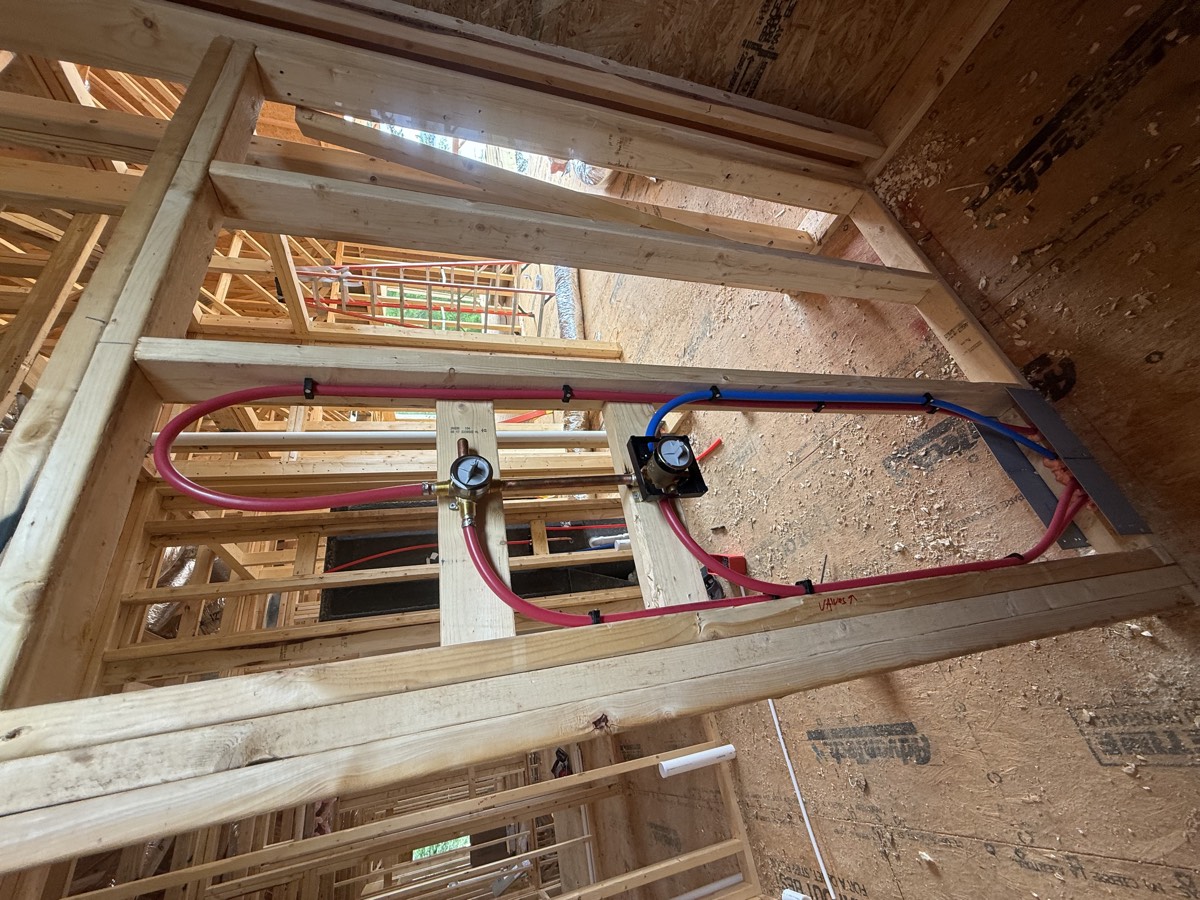 PEX water lines roughed in for a new bathroom